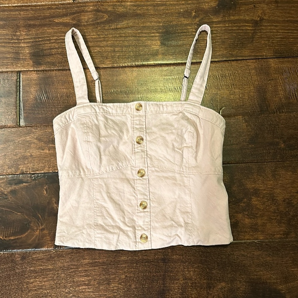 Abercrombie and Fitch adjustable cropped tank top in light pink.